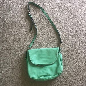 Medium sized, sea foam green, cross body purse